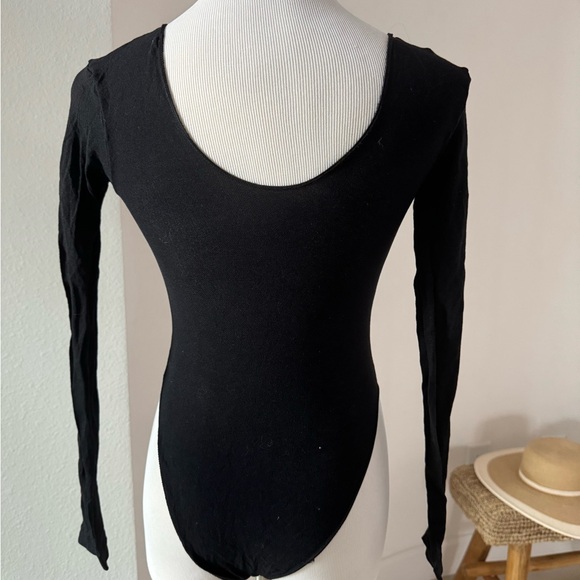 Assorted lingerie. One crotchless body stocking, one chemise, one body suit. - Picture 2 of 10